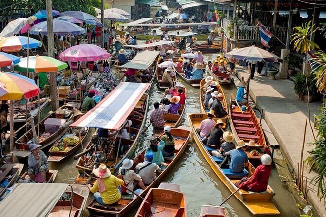 Amphawa Floating Market and Maeklong Train Market Tour - Amphawa Floating Market by boat: trade meets daily canal life