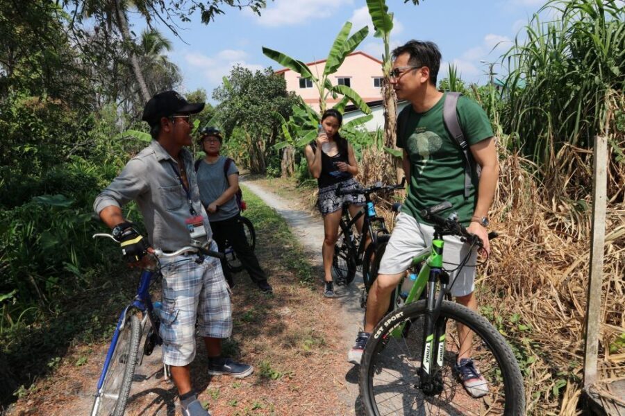 Bangkok: Bike and Canal Boat Tour with Lunch - Bikes, helmets, and staying comfortable for 210 minutes