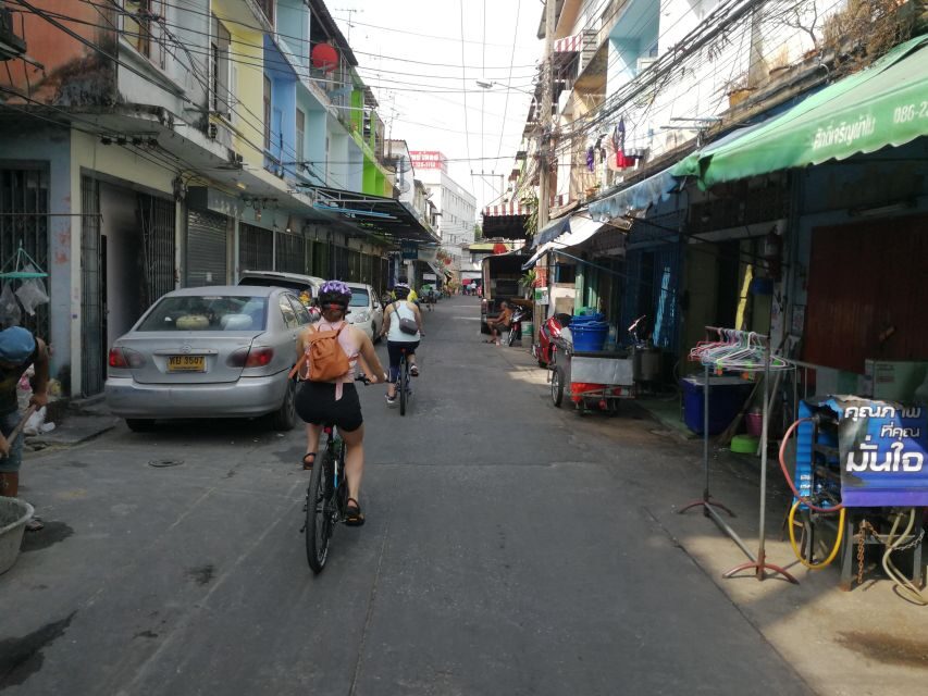 Bangkok: Bike and Canal Boat Tour with Lunch - Wat Paknam Phasi Charoen and the big Buddha experience
