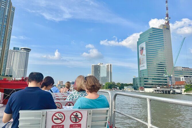 Bangkok: Boat Bliss Riverside Cruise Tour and Wat Arun Visit - Pak Khlong Talat at Rajini Pier: flowers with a market past
