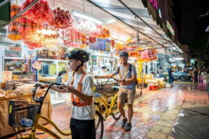 Bangkok by Night Cycling Tour with Street-food Meal - Getting Started at River City and Rolling Into the Night