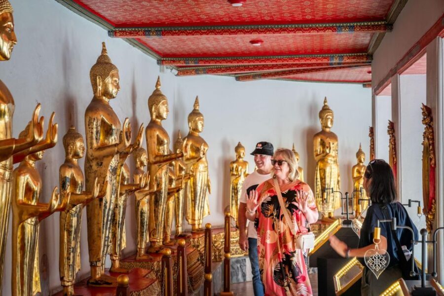 Bangkok: Canals Tour Wat Arun & Chao Phraya by Longtail Boat - Museum Siam: when Bangkok history feels like a game
