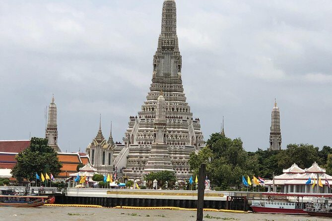 Bangkok: City Highlights Temple and Market Walking Tour - Wat Arun (Temple of Dawn): the 70-meter tower and its porcelain sparkle