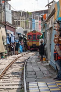 Bangkok: Floating Market, Phra Pathom Pagoda & Cafes Tour - Maeklong Railway Market: train choreography you can actually watch