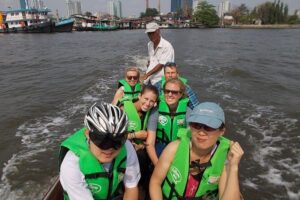 Bangkok Green Oasis 4-Hour Bike Tour with Boat Ride - Stop 1: Wat Khlong Toei Nok Pier and the short long-boat segment