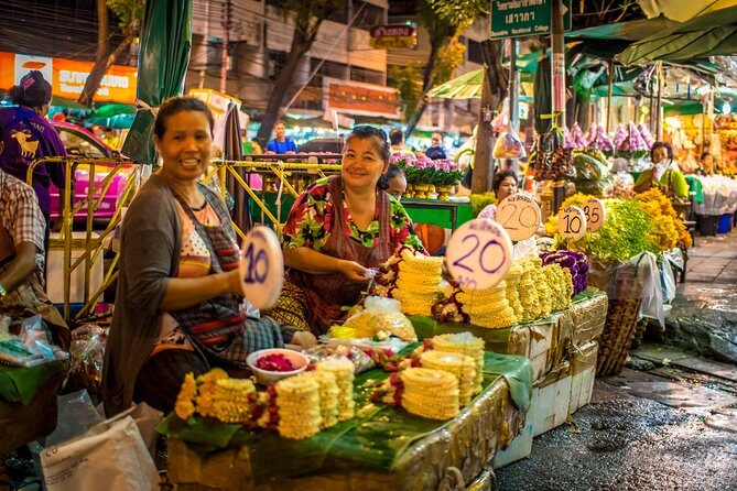 Bangkok: Night Bike Tour with Temples & Flower Market Visit - The Ferry Crossing: a Skyline Moment With Bikes Included