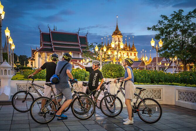 Bangkok: Night Bike Tour with Temples & Flower Market Visit - Grand Palace Area After Dark: Less Crowds, Same Glow