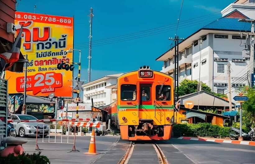 Bangkok: Railway, Floating Market & Chao Phraya Cruise Tour - Damnoen Saduak Floating Market by boat: canal life up close