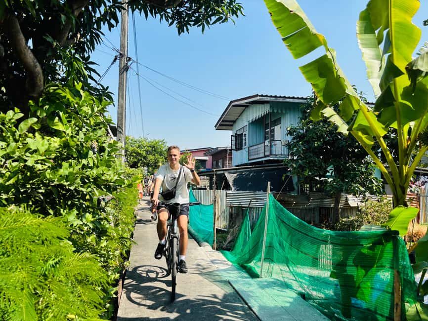 Bangkok: Temples, Canals & Local Life Bike Tour - Bikes, helmets, and the real pace in Bangkok traffic