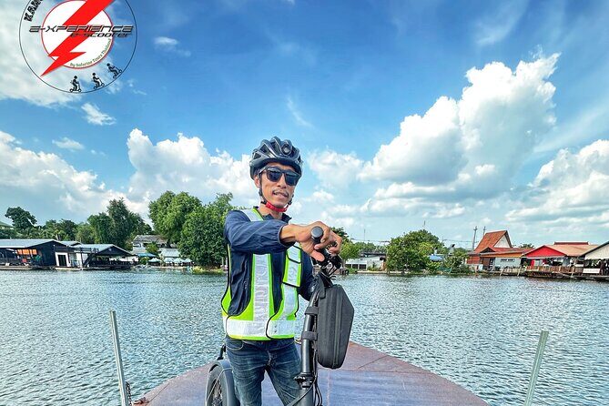 E-Scooter Tour in Kanchanaburi - Café break with terrace views: how to use the stop well