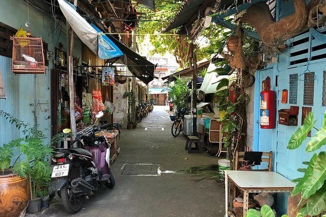 Experience Real Bangkok by Bike - Crossing the Chao Phraya into Thonburi by bridge or local ferry