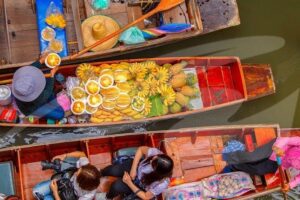 Floating Markets and Bridge on River Kwai Tour from Bangkok - The early drive past salt fields and rice country