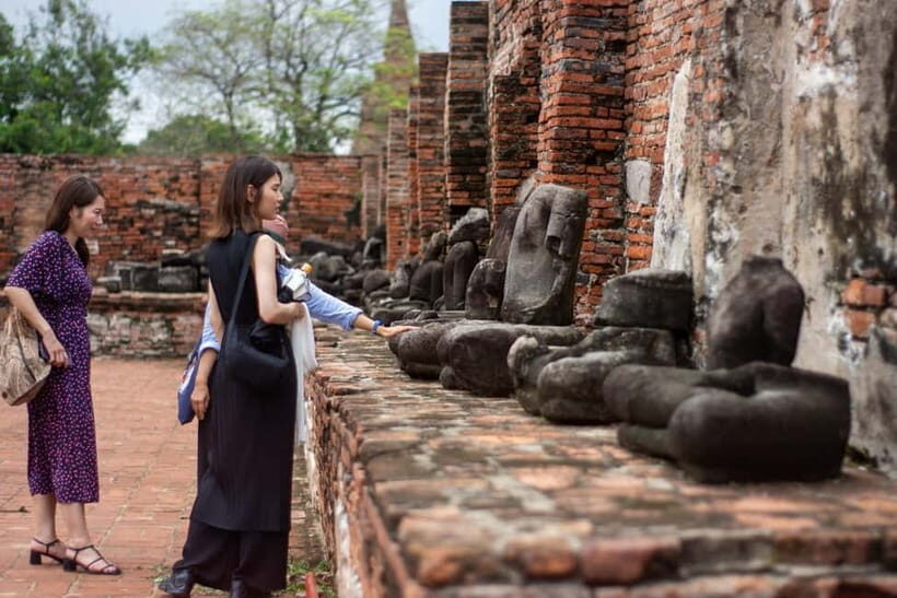 From Bangkok: Affordable Ayutthaya Highlights Tour - Wat Maha That’s Tree-Root Buddha Head: A Scene That Looks Like a Movie