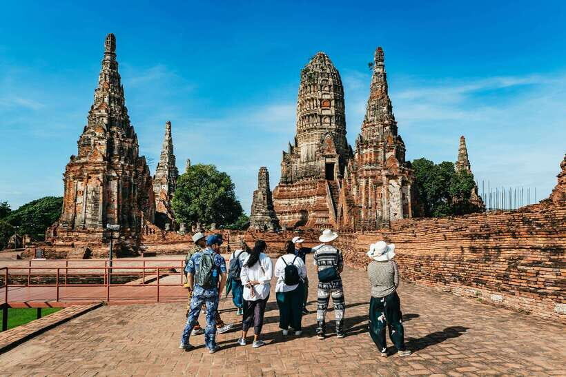 From Bangkok: Ayutthaya Temples Guided Tour with Lunch - Wat Chaiwatthanaram and Wat Lokayasutha: the first temples set the tone