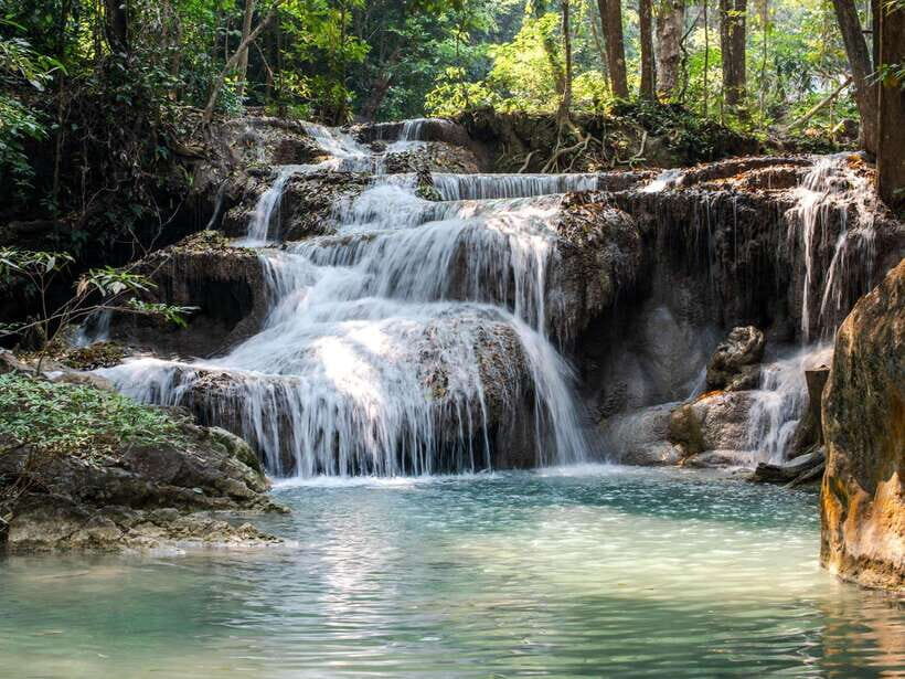 From Bangkok: Erawan Park & Kanchanaburi Small-Group Tour - Sustainable Touches: Glass Bottles and Carbon Offsets That Are More Than PR