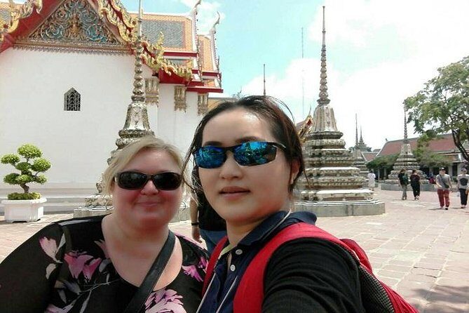 Half-Day Bangkok City Tour with The Grand Palace Private - Wat Pho and the Reclining Buddha: a powerful first stop