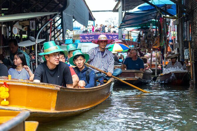 Half Day Railway Market and Damnoen saduak Floating Market tour - Mae Klong Railway Market (Hoop Rom Market): the train timing is the whole point