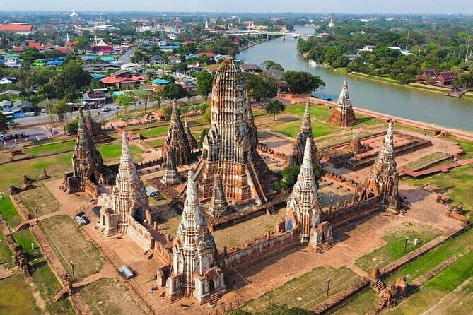 Private Floating Market & Maeklong Railway Tour from Bangkok - Damnoen Saduak by long-tail boat: shopping, snacks, and canal life