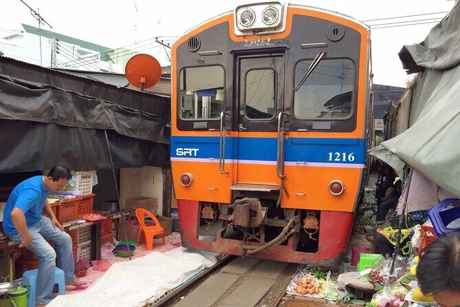 Private Maeklong Railway Market and Amphawa Day Tour from Bangkok - Wat Bang Kung: a short temple visit with specific historical ties