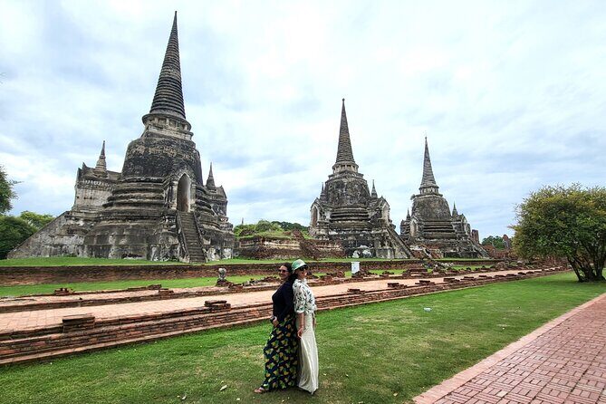 Private Tour to Ayutthaya, World Heritage Site with Boat Tour - Stop 1: Wat Yai Chai Mongkhon’s chedis and calm atmosphere