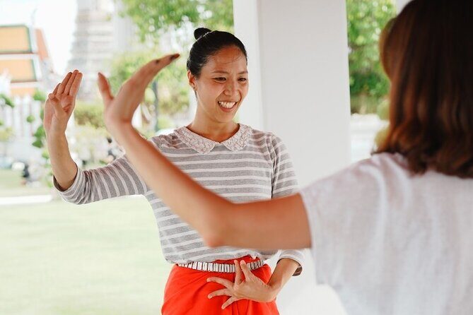 Thai Dance Class at Wat Arun - Getting into costume: nails, jewelry, and posture-ready dressing