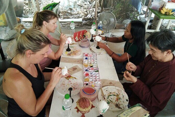 The Story of Handicrafts Full Day Experience from Bangkok - Ko Kret cycling: homes, vegetation, temples, and the kiln site