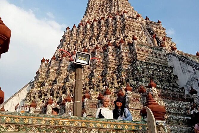 Visit Wat Pho and Wat Arun with Local Expert - Wat Pho: reclining Buddha scale, gold leaf details, and smart etiquette